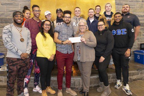 InterGreek Council check presentation