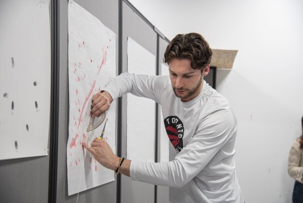 Eric Vitale works in the crime scene lab.